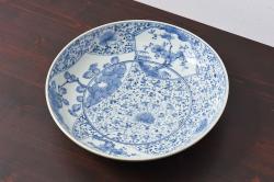 【骨董買取】江戸期　古伊万里　花唐草文　染付　九寸深皿(渦福)を買取りました。